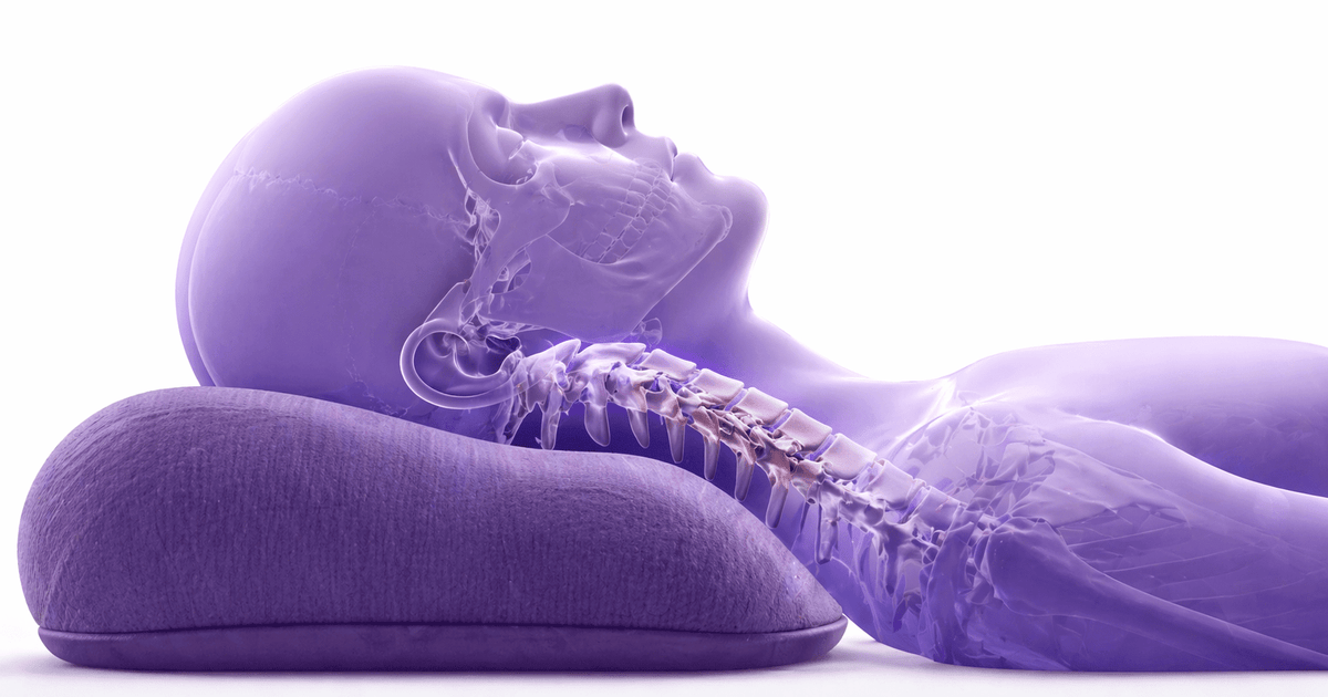 Person lying with head and neck supported by an ergonomic pillow, demonstrating correct cervical alignment