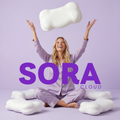SORA Cloud ergonomic contoured pillow lifestyle shot with woman in lavender pajamas surrounded by white pillows on purple background